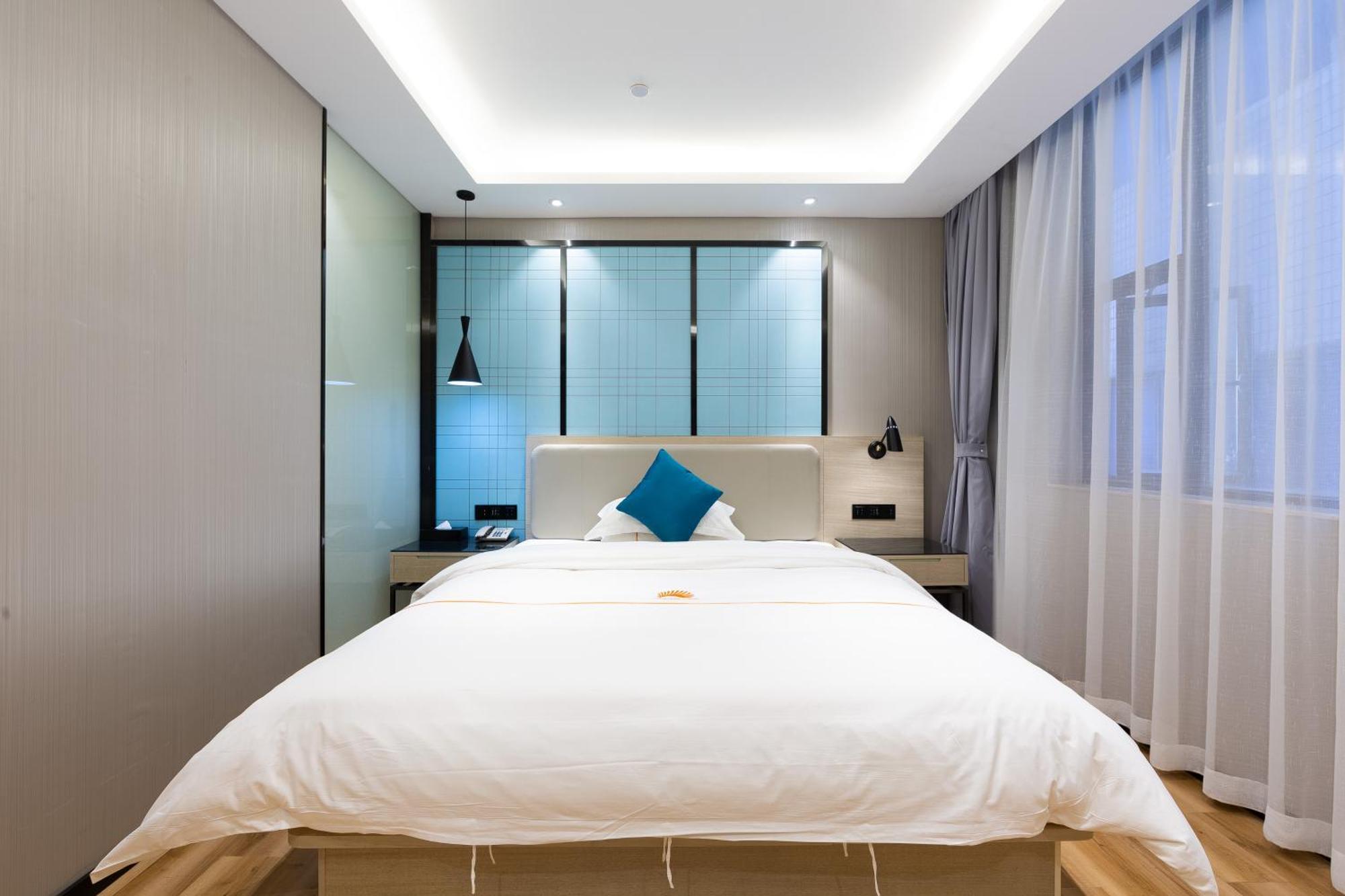 גואנגג'ואו Warm Yes Business Hotel מראה חיצוני תמונה