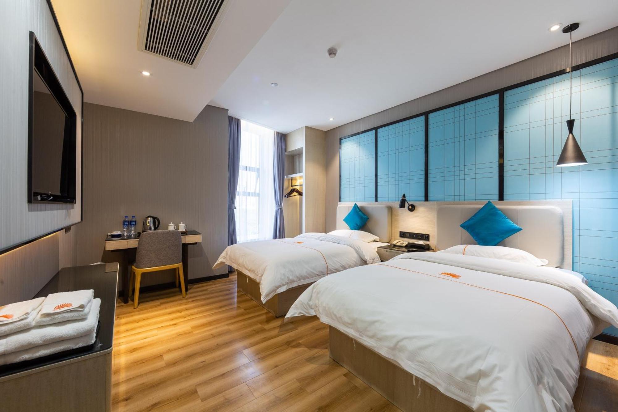גואנגג'ואו Warm Yes Business Hotel מראה חיצוני תמונה