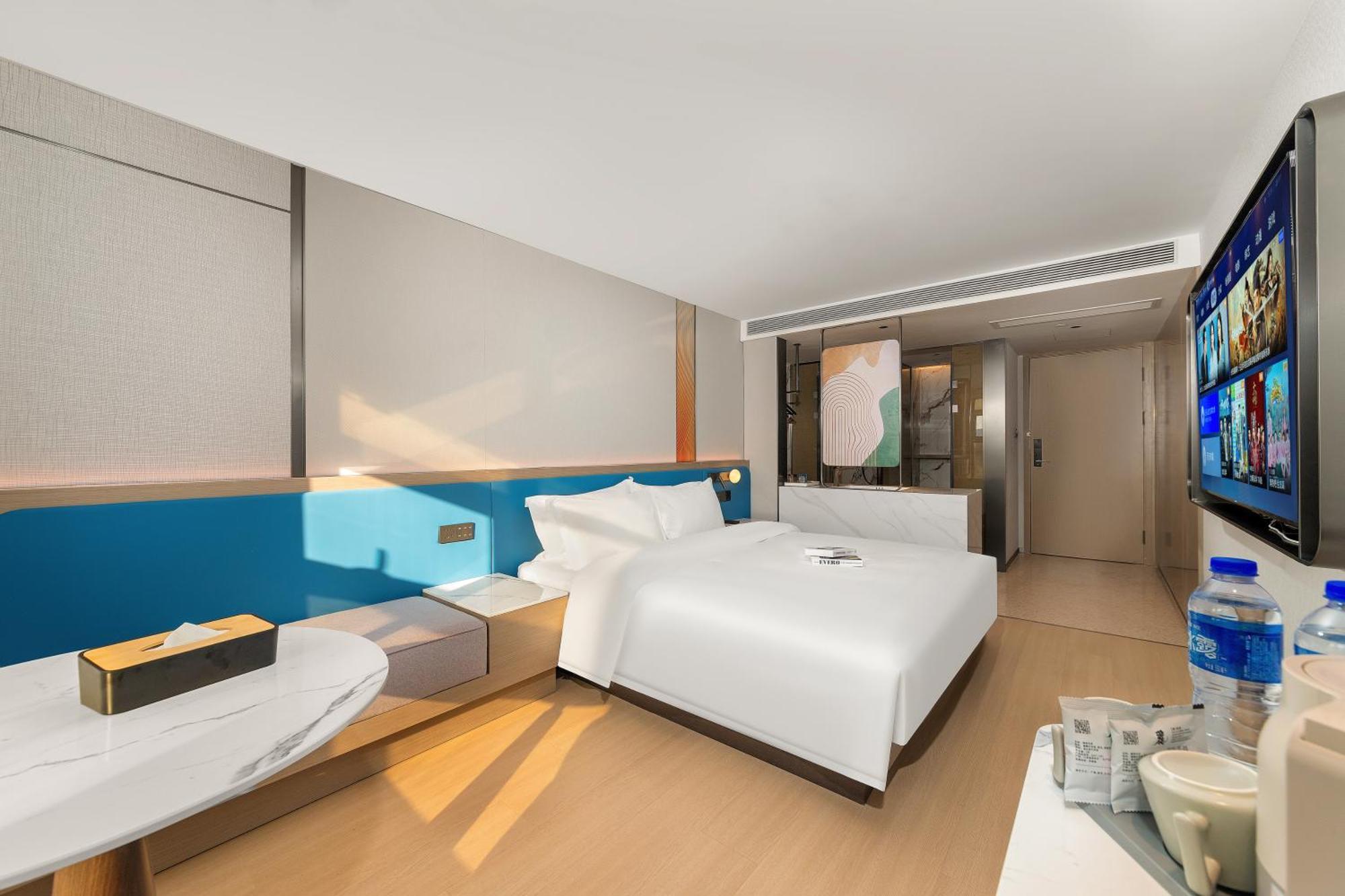 גואנגג'ואו Warm Yes Business Hotel מראה חיצוני תמונה