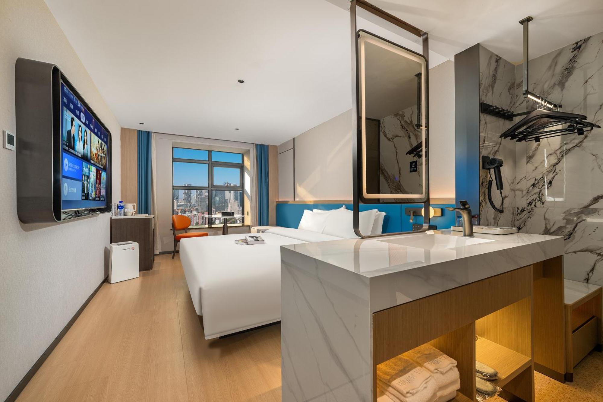 גואנגג'ואו Warm Yes Business Hotel מראה חיצוני תמונה